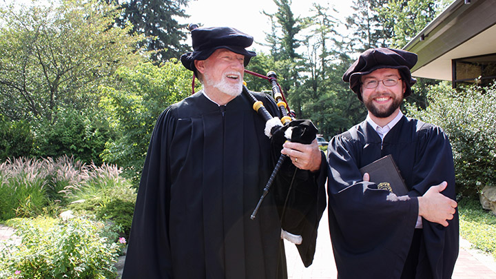 Bagpipe player Roger Billings with Jacob Thielman (a.k.a. Rev. John Knox).